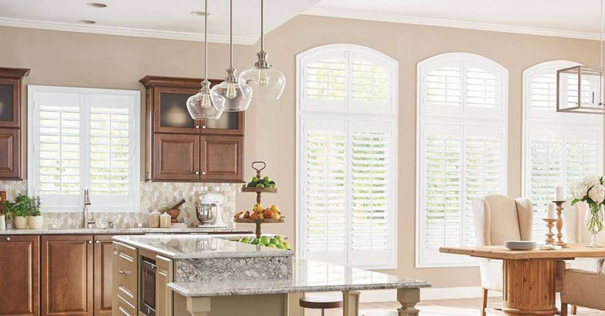 white shutters in a kitchen and a dining room